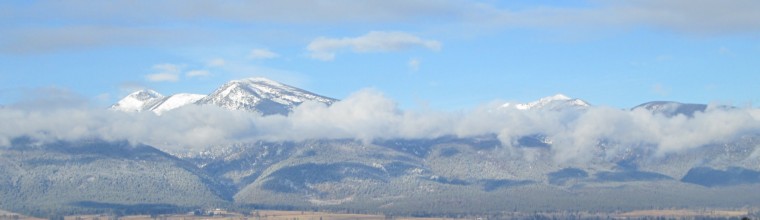 Bitter Root Mountains as seen from Oasis Montana solar water pumping office